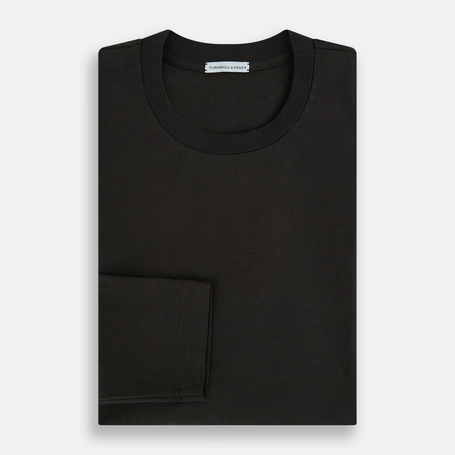 View 5 of product The Dark Chocolate Long-Sleeve T-shirt by Turnbull & Asser, featuring a plain crew neck design with no visible logos, is laid flat on a white background to showcase its quality and versatility.