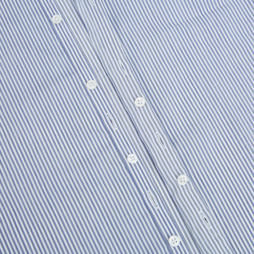 The Turnbull & Asser Navy and White Stripe Westminster Shirt features thin vertical stripes, a Turnbull collar, long sleeves, and classic British craftsmanship, shown flat on a white background.