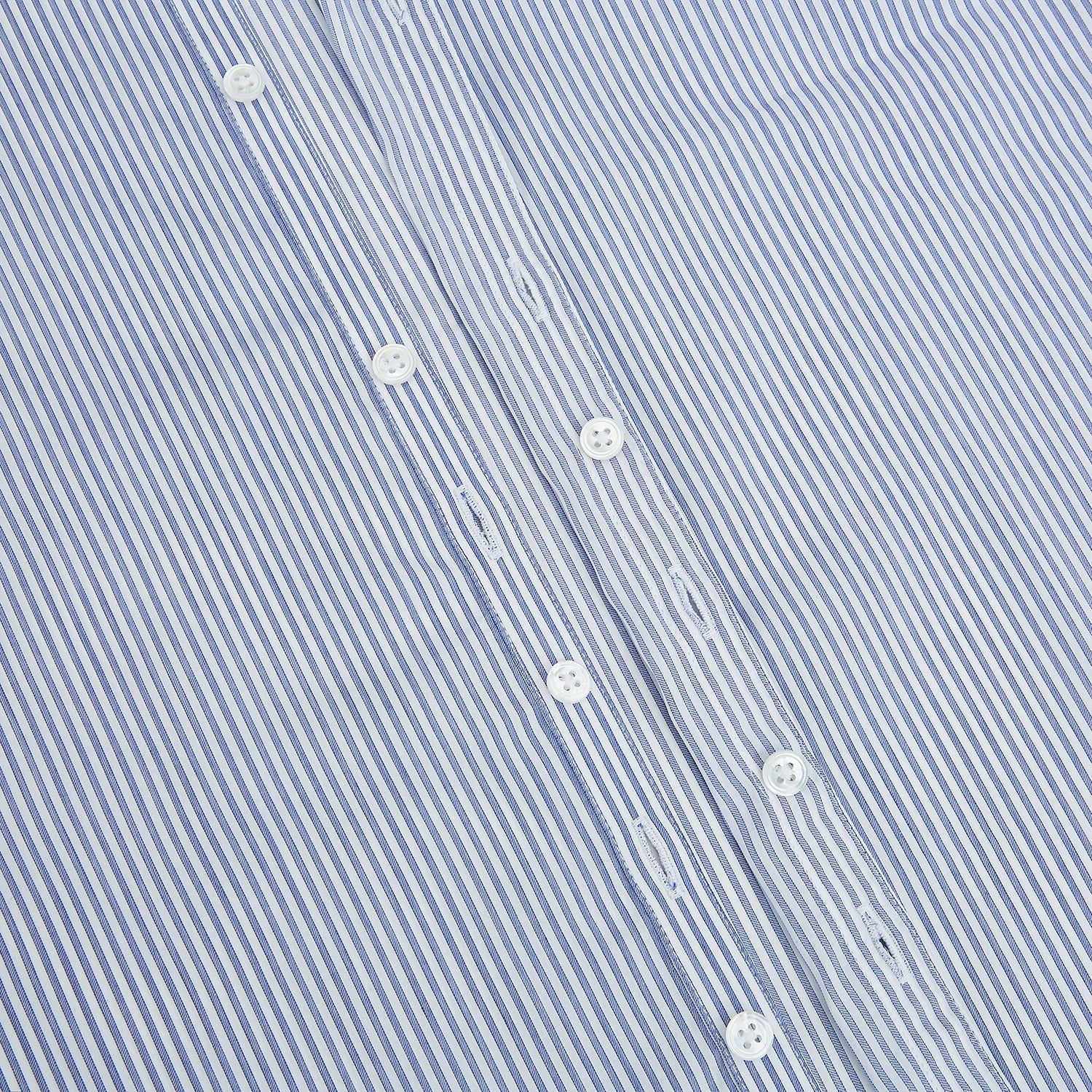 View 6 of product The Turnbull & Asser Navy and White Stripe Westminster Shirt features thin vertical stripes, a Turnbull collar, long sleeves, and classic British craftsmanship, shown flat on a white background.