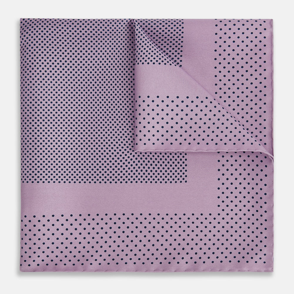The Lilac Dot Silk Pocket Square by Turnbull & Asser is handmade from silk in a folded design, featuring small black polka dots and a solid border.