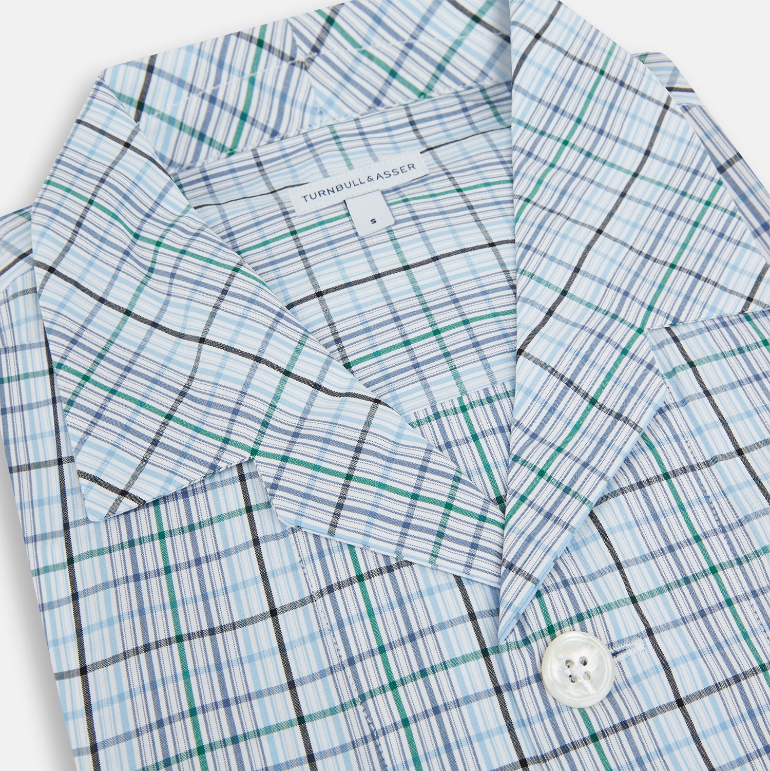 View 2 of product Turnbull & Asser’s Blue and Green Multi Check Pyjama Shirt features long sleeves and a button-up design with a blue and green plaid pattern—ideal for elegant loungewear or stylish nightwear.