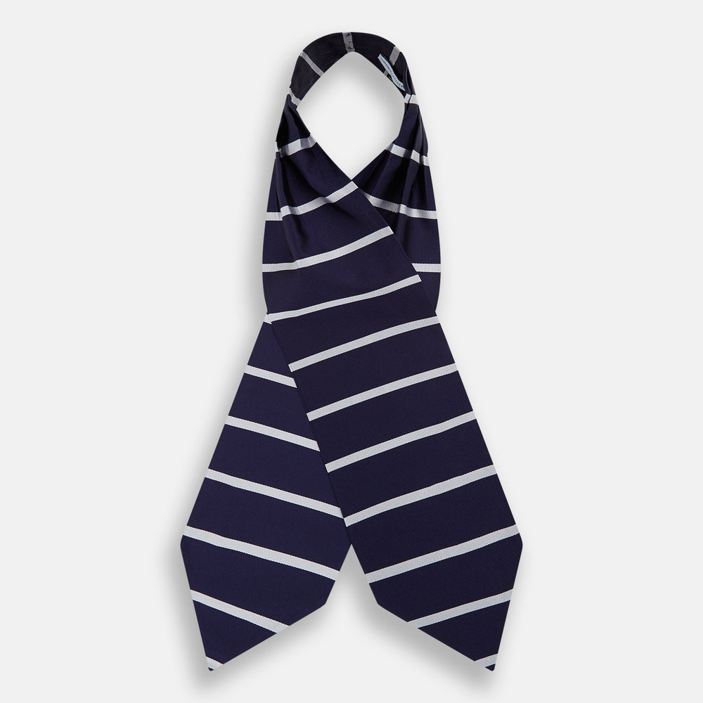 The Turnbull & Asser Silver Stripe and Navy Silk Cravat features two horizontal white stripes on navy silk, offering a sophisticated British-inspired design—ideal as a unique wedding accessory.