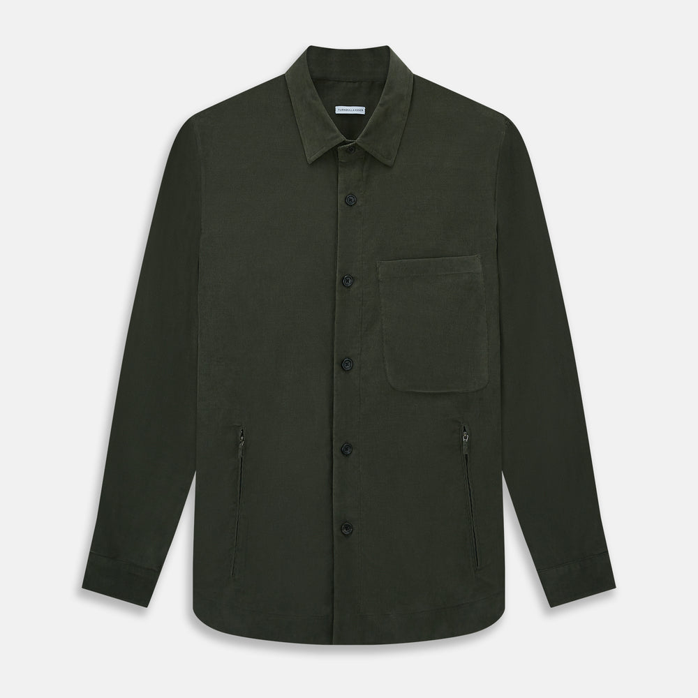 The Turnbull & Asser Olive Corduroy Hampstead Overshirt for men features a collar, long sleeves, left chest pocket, and two zippered side pockets, shown laid flat on a white background.