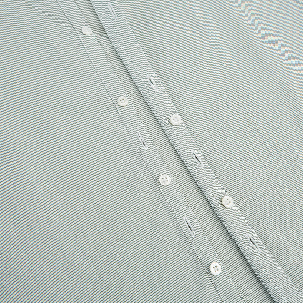 A dark green hairline stripe Westminster shirt by Turnbull & Asser, featuring long sleeves, a classic collar, tailored fit, white front buttons, and buttoned cuffs, laid flat on a white background.