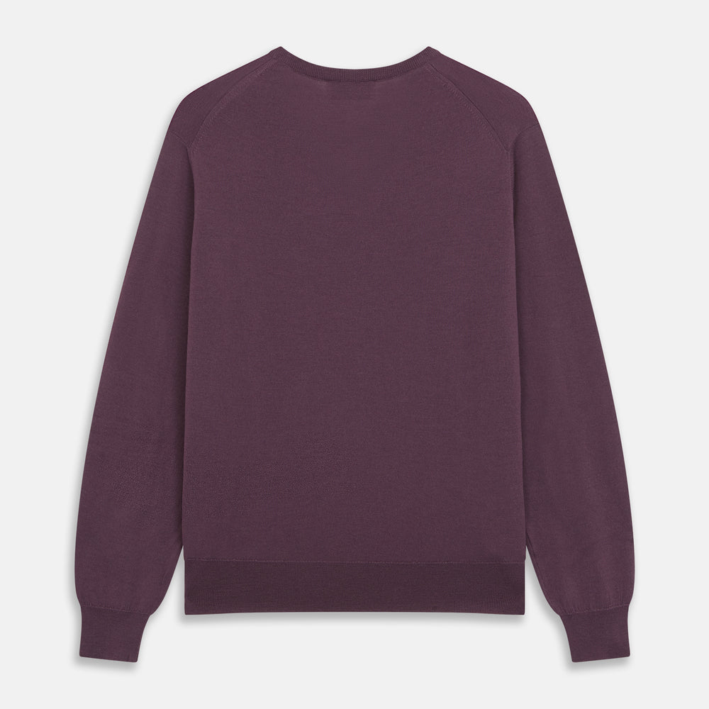 The Turnbull & Asser Plum Kennedy Merino V-Neck Jumper is a long-sleeved knitwear piece made from soft Italian wool, shown laid flat on a white background.