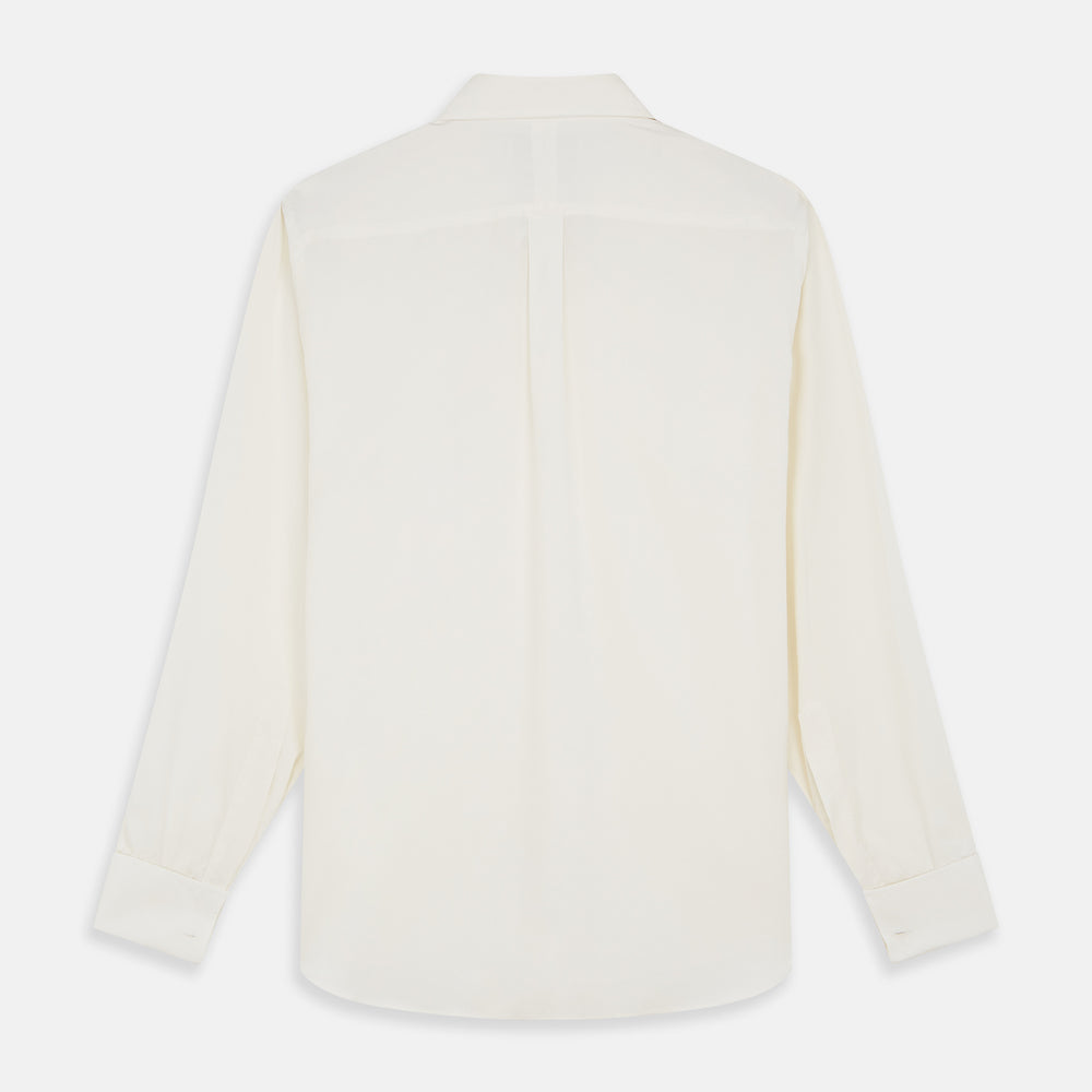 The Turnbull & Asser Cream Silk Weekend Fit Fairlight Shirt is a classic, soft-touch long-sleeve shirt with a collar, button-down front, and buttoned cuffs, shown laid flat on a plain white background.