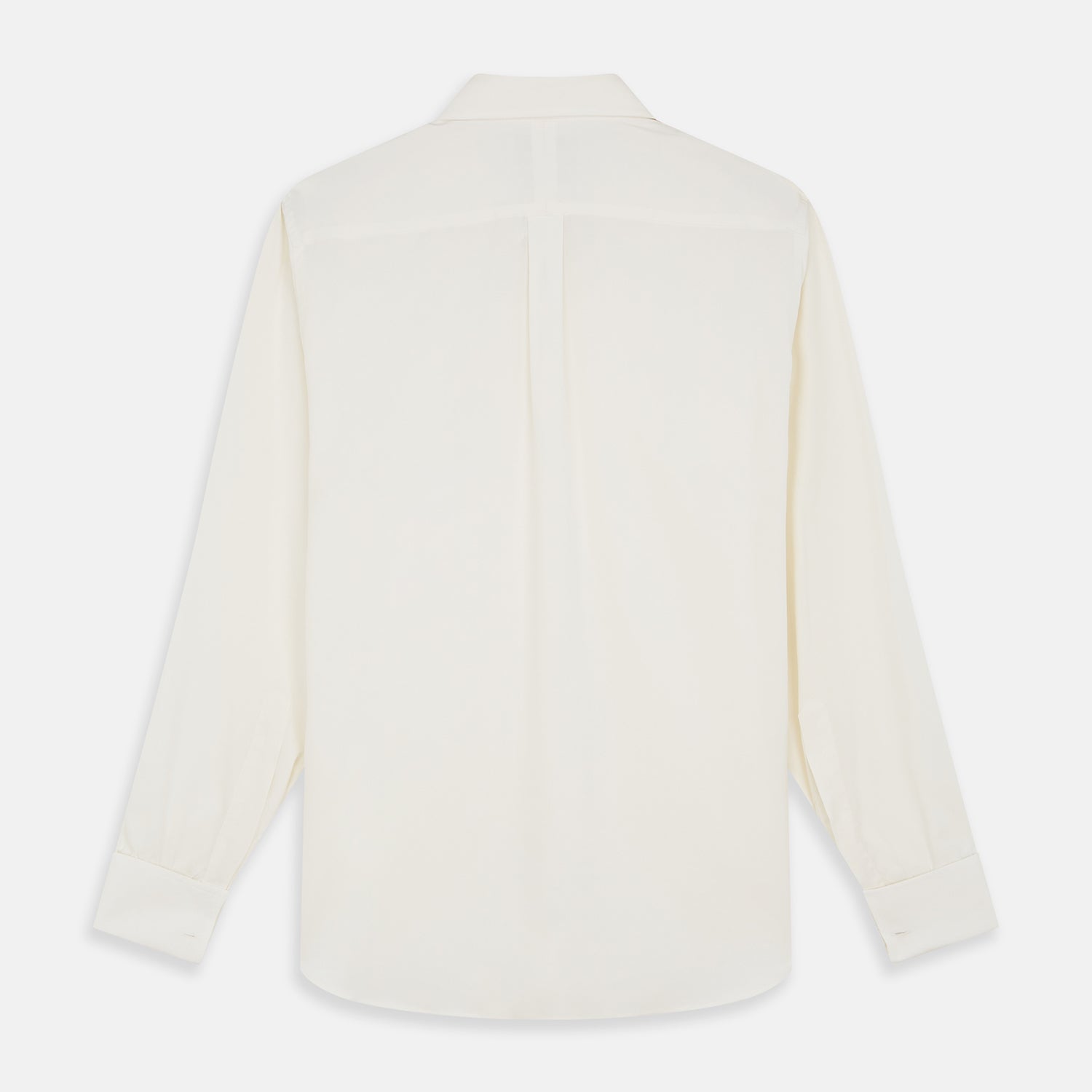 View 5 of product The Turnbull & Asser Cream Silk Weekend Fit Fairlight Shirt is a classic, soft-touch long-sleeve shirt with a collar, button-down front, and buttoned cuffs, shown laid flat on a plain white background.
