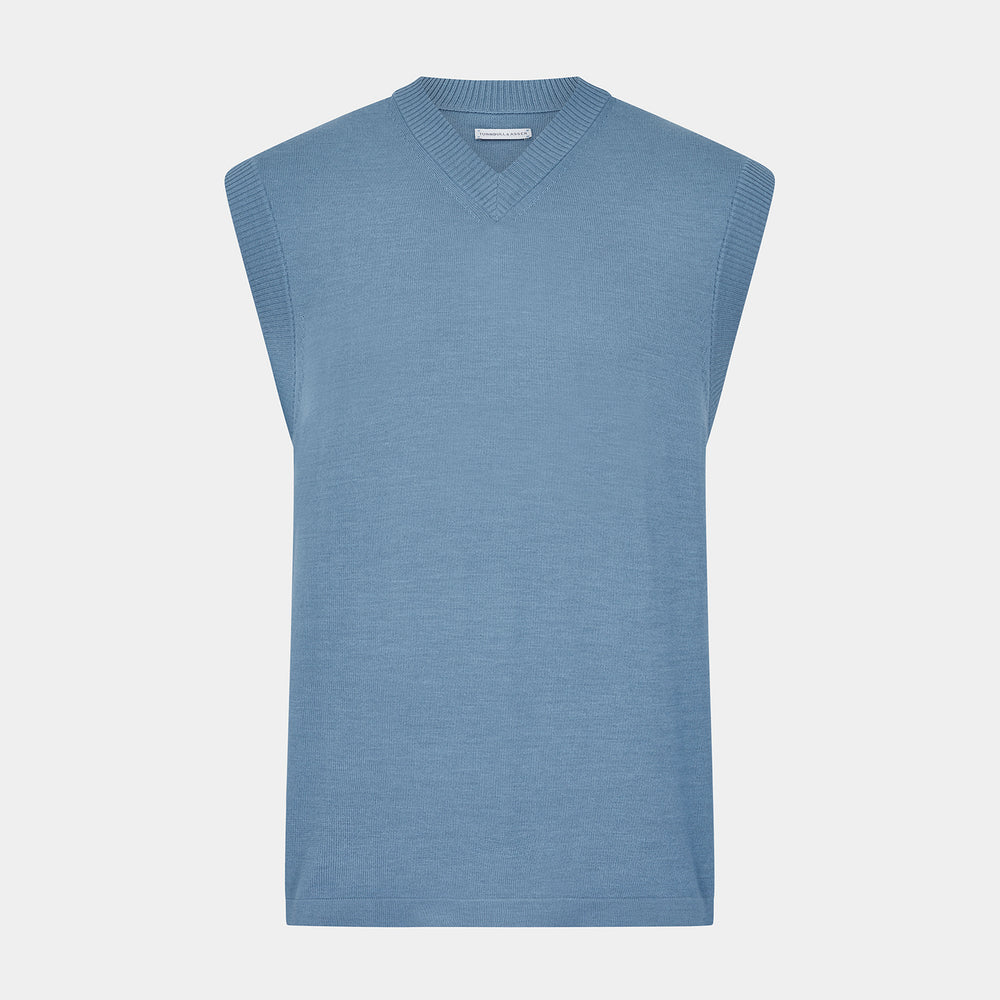 The Turnbull & Asser Pale Blue Fine Merino V-Neck Vest features a sleeveless design, knit texture, and classic V-neckline, shown against a plain white background.