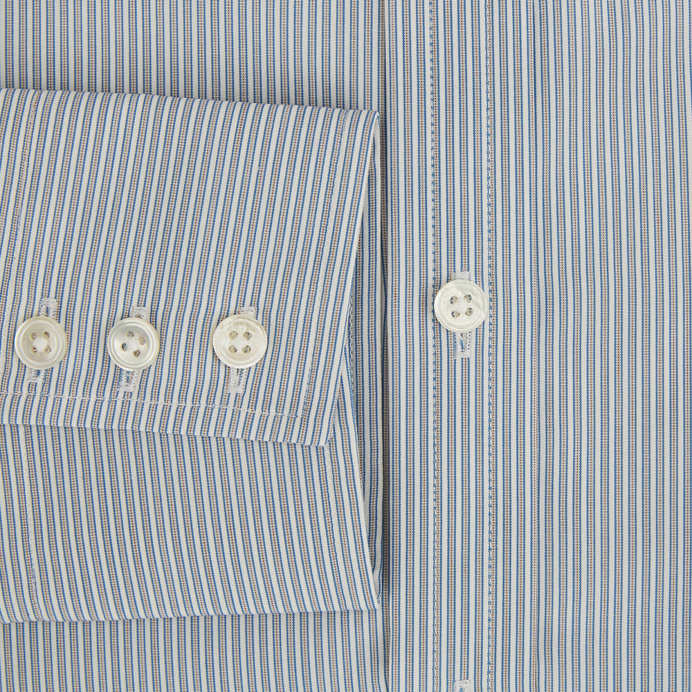 The Blue and Brown Ticking Stripe Mayfair Shirt by Turnbull & Asser, crafted from premium Italian cotton with a collar, white buttons, and buttoned cuffs, is an essential addition to any gentleman's wardrobe.