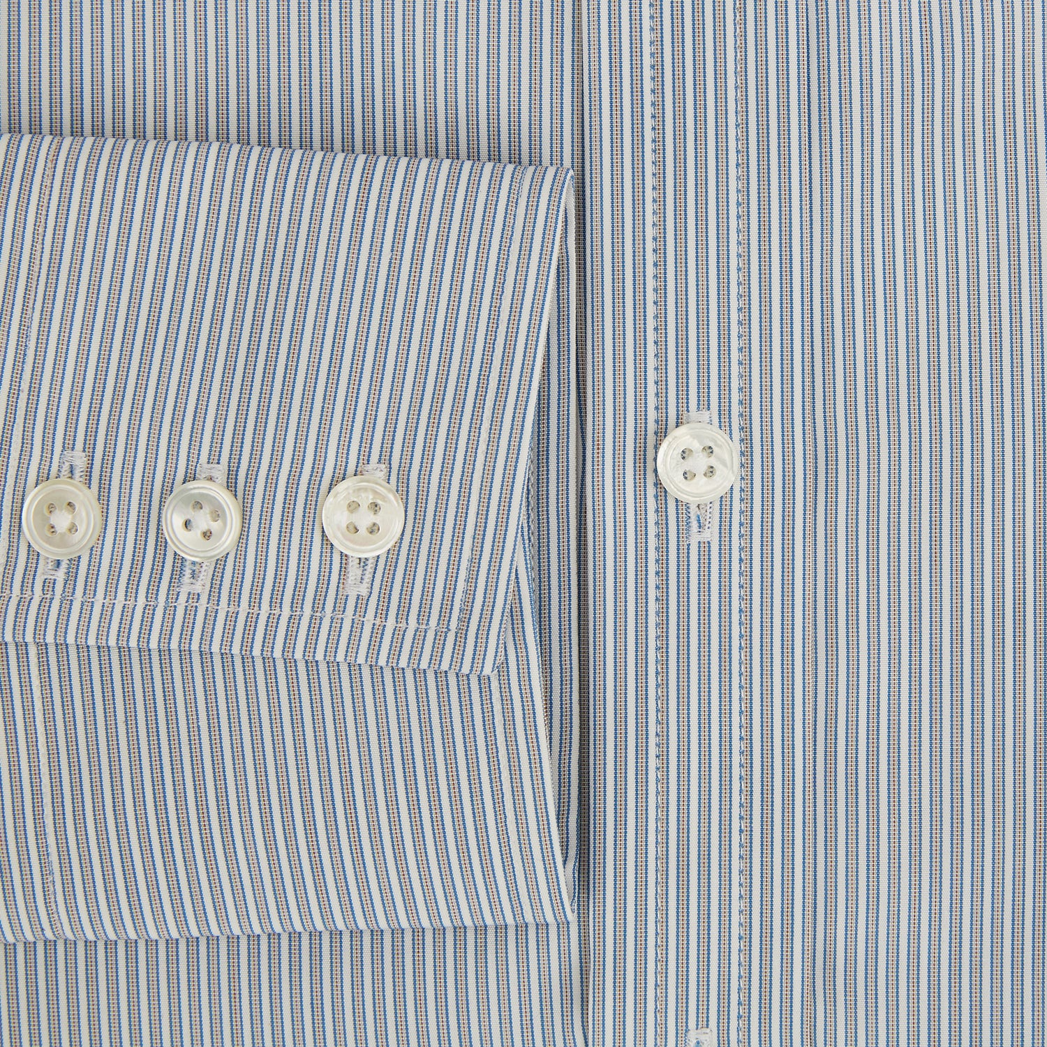 View 4 of product The Blue and Brown Ticking Stripe Mayfair Shirt by Turnbull & Asser, crafted from premium Italian cotton with a collar, white buttons, and buttoned cuffs, is an essential addition to any gentleman's wardrobe.