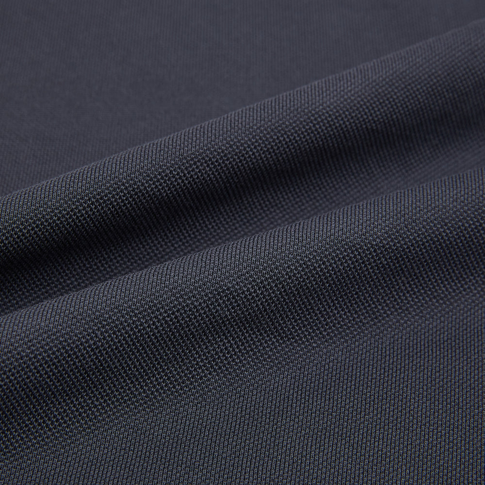 The Turnbull & Asser Charcoal Polo Shirt is a short-sleeve, soft cotton jersey top with a collar, three-button placket, and a left chest pocket, shown on a plain white background.