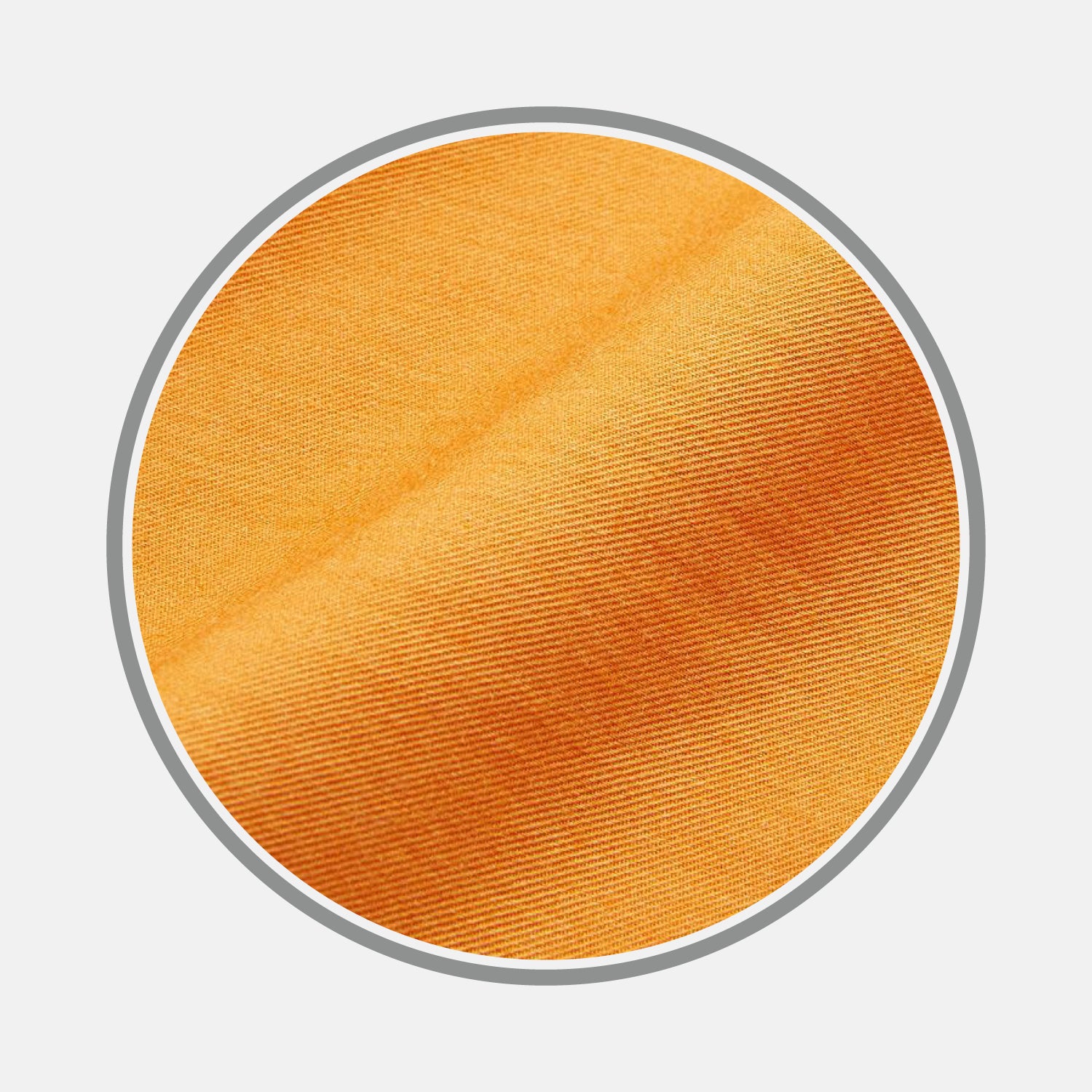View 1 of product Close-up of Turnbull & Asser Plain Orange Cotton & Wool Fabric, showing its diagonal weave in a circular frame with a gray border on a white background.