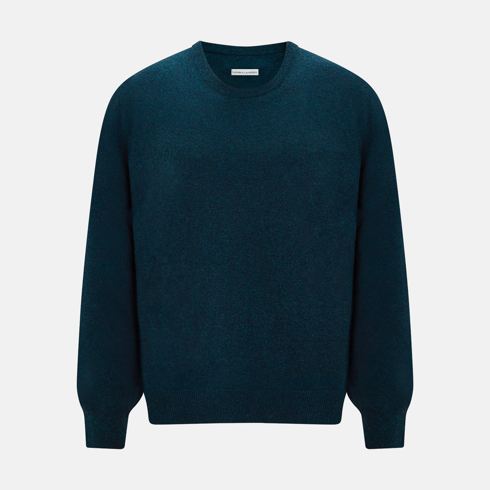 The Turnbull & Asser Dark Green Melange Cashmere Round Neck Jumper features long sleeves with ribbed cuffs and a ribbed hem, shown against a plain white background.