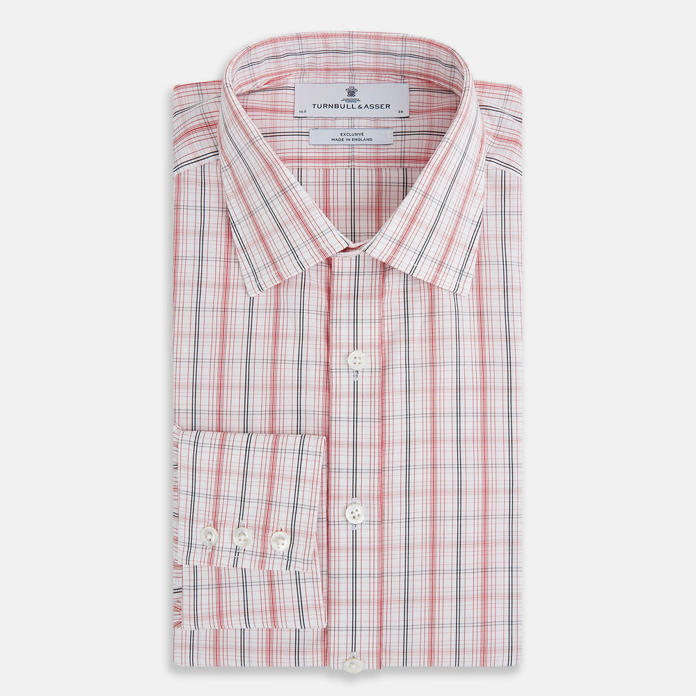 The Turnbull & Asser Red Multi Check Mayfair Shirt is a long-sleeve, button-up with a collar, crafted from Italian cotton and featuring a red multi check plaid pattern on white, shown laid flat against a white surface.