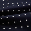 View 4 of product The White Dot and Navy Silk Cravat by Turnbull & Asser features evenly spaced white polka dots on navy silk—a classic accessory ideal for adding British elegance to any look.