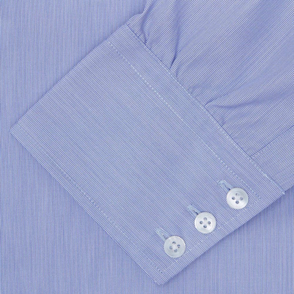 The Turnbull & Asser Blue Hairline Stripe Shirt features a T&A collar, 3-button cuffs, and subtle stripes, displayed neatly folded against a plain white background.