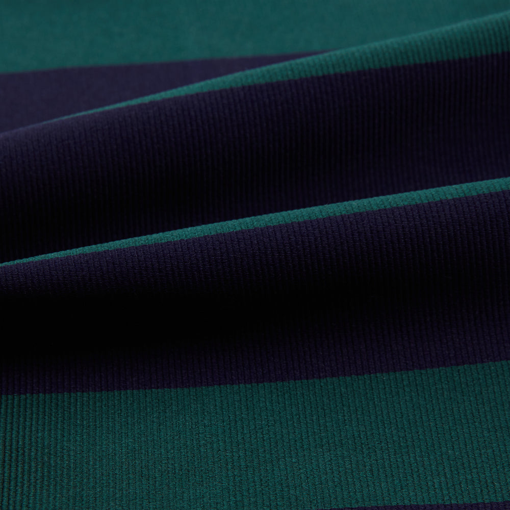 The Wide Green Stripe and Navy Silk Cravat from Turnbull & Asser features bold diagonal stripes in dark green and navy—an ideal wedding accessory for a refined touch of British style.