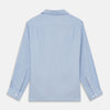 View 5 of product The Turnbull & Asser Slate Blue Chambray Holiday Fit Fellows Shirt features long sleeves and a classic collar, laid flat on a white background—a versatile summer piece for any occasion.