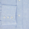 View 4 of product The Turnbull & Asser PALE BLUE LINEN MAYFAIR SHIRT features long sleeves, a classic collar, and lightweight linen fabric in a refined Mayfair fit, shown on a white background.