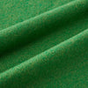 View 3 of product The Turnbull & Asser Plain Kelly Green Cashmere Knitted Scarf is shown looped at the top with both ends hanging down, its soft texture and vibrant color standing out against a plain white background.