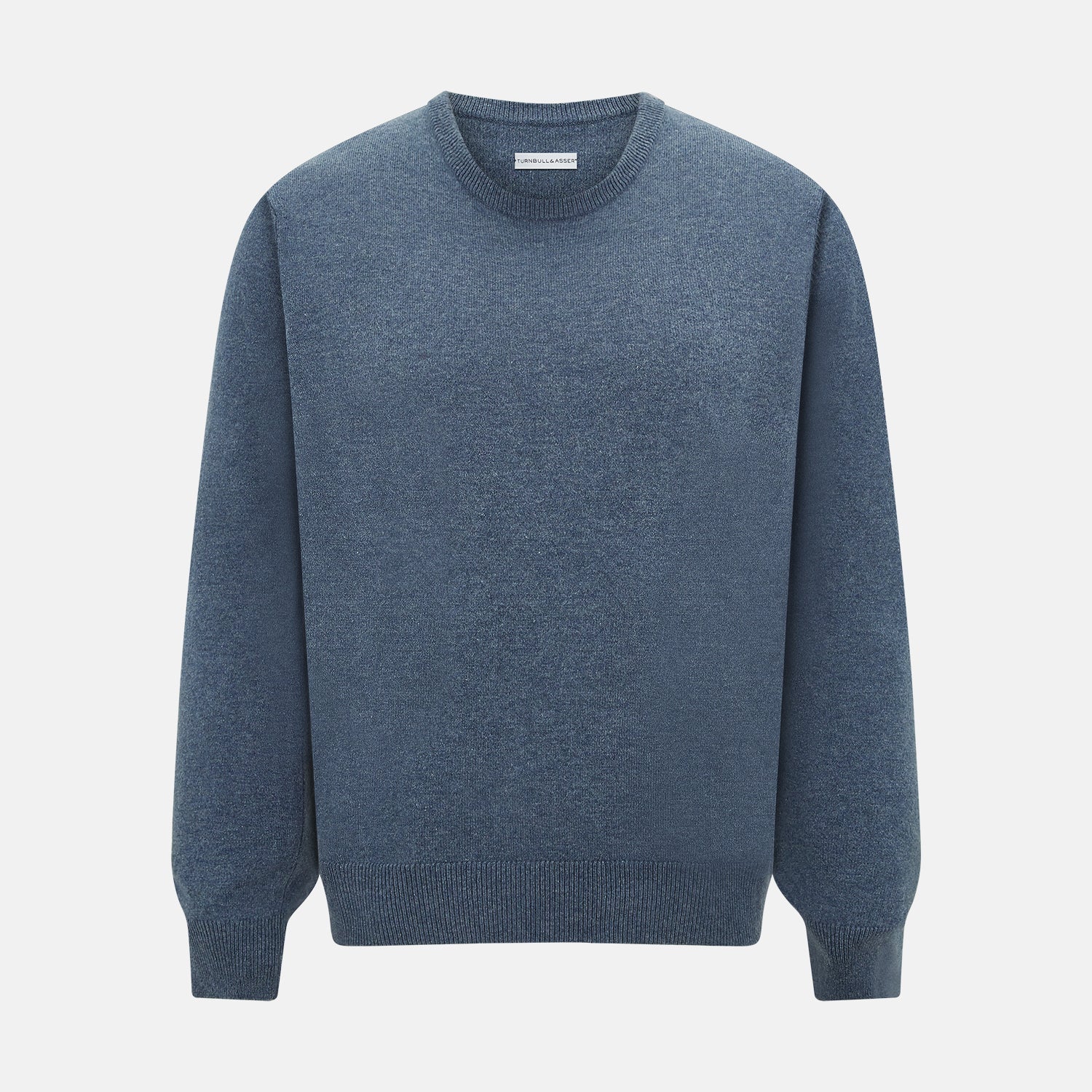 View 1 of product The Turnbull & Asser Pacific Blue Cashmere Round Neck Jumper features long sleeves and ribbed cuffs, hem, and neckline, shown on a light grey background.