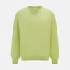 View 1 of product The Turnbull & Asser Melon Green Merino V-Neck Jumper is shown on a white background, featuring long sleeves, ribbed cuffs, and a ribbed hem.
