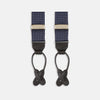 View 4 of product Turnbull & Asser Navy & White Small Spot Adjustable Silk Braces feature black leather loops and silver clasps—timeless accessories displayed on a white background.