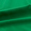 View 2 of product The Turnbull & Asser Green Silk Hyde Pyjamas Set features a long-sleeve button-up top with three pockets and modern fit elastic waistband pants in silk blend, both shown laid flat on a white background.