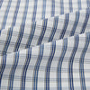 View 8 of product The Azzurro Multi Check Westminster Shirt by Turnbull & Asser is a long-sleeve, button-up with a white base and blue and gray checks, displayed flat against a white background.