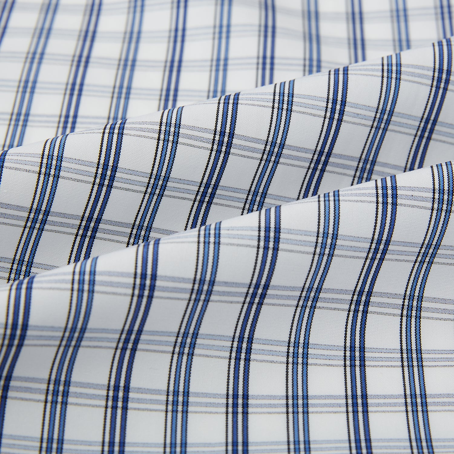 View 8 of product The Azzurro Multi Check Westminster Shirt by Turnbull & Asser is a long-sleeve, button-up with a white base and blue and gray checks, displayed flat against a white background.