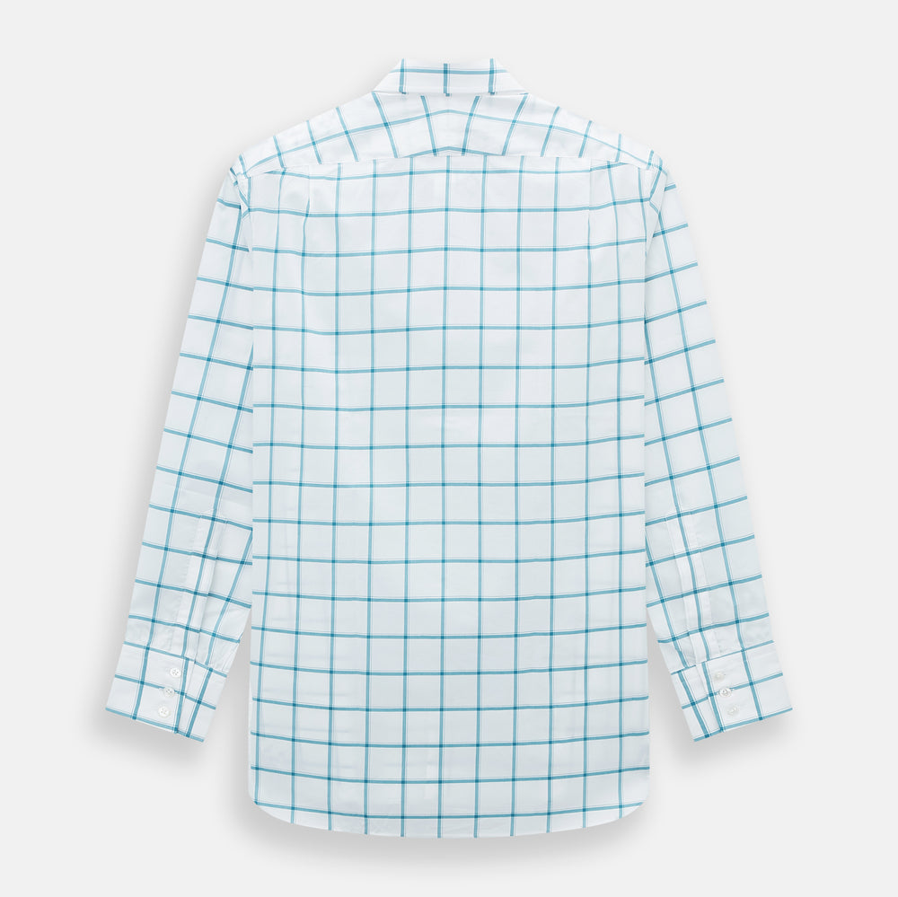 The Turnbull & Asser Turquoise Grid Check Mayfair Shirt is crafted from Italian cotton with a white base and turquoise grid pattern, featuring long sleeves, a pointed collar, and buttoned cuffs.