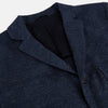 View 2 of product The Turnbull & Asser Navy Linen Blend Cambridge blazer features British tailoring with a notched lapel, two buttons, and three front pockets, shown on a plain white background.