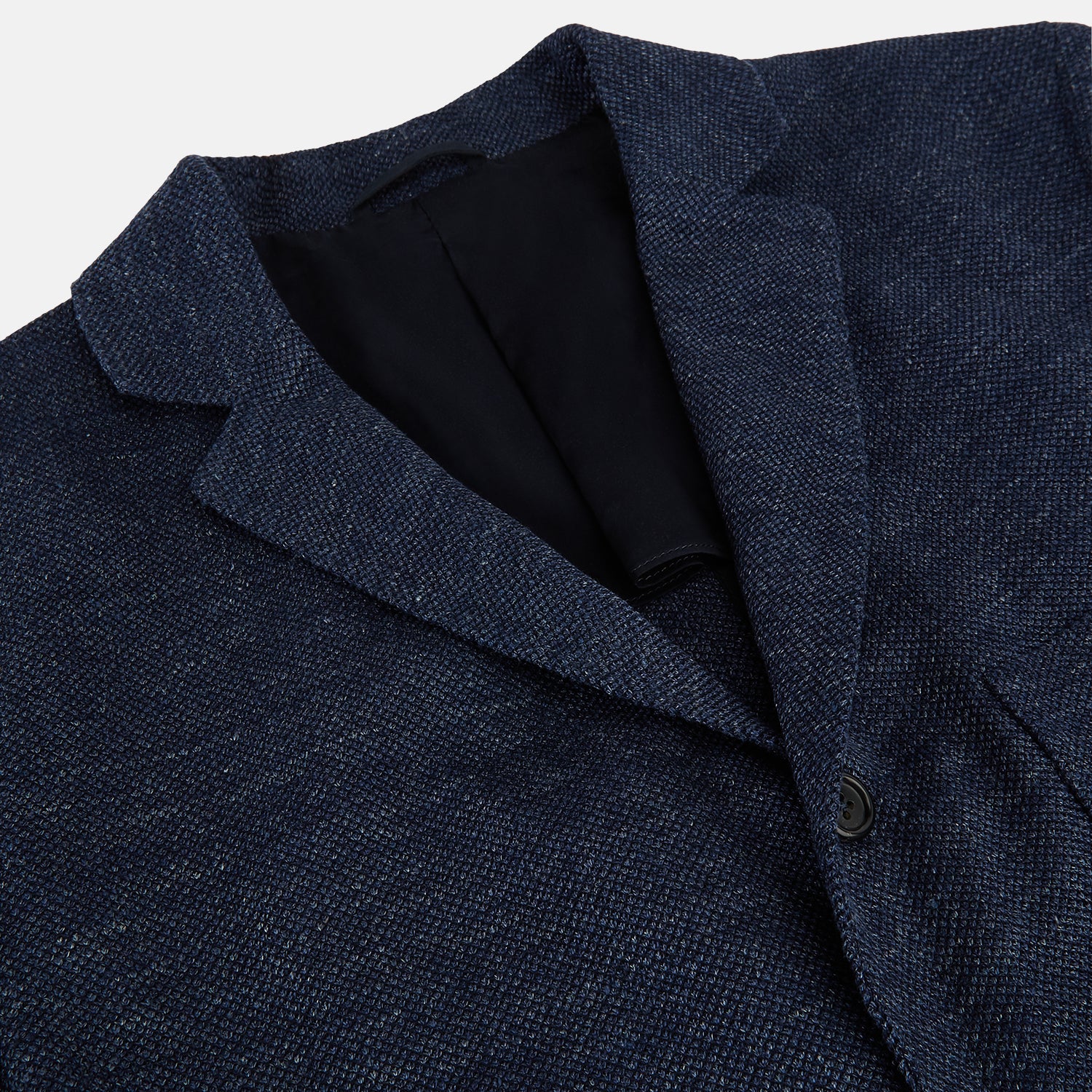 View 2 of product The Turnbull & Asser Navy Linen Blend Cambridge blazer features British tailoring with a notched lapel, two buttons, and three front pockets, shown on a plain white background.
