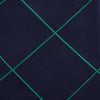 View 3 of product The Turnbull & Asser Green and Navy Window Pane Silk Tie features a subtle ribbed texture with a diagonal green grid pattern, inspired by archival designs—a stylish choice for modern office attire.