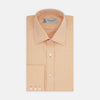 View 1 of product A neatly folded Orange Oxford Classic Fit Shirt with a T & A collar by Turnbull & Asser is displayed on a white background—a versatile piece for minimalist outfits or pairing with bold ties.