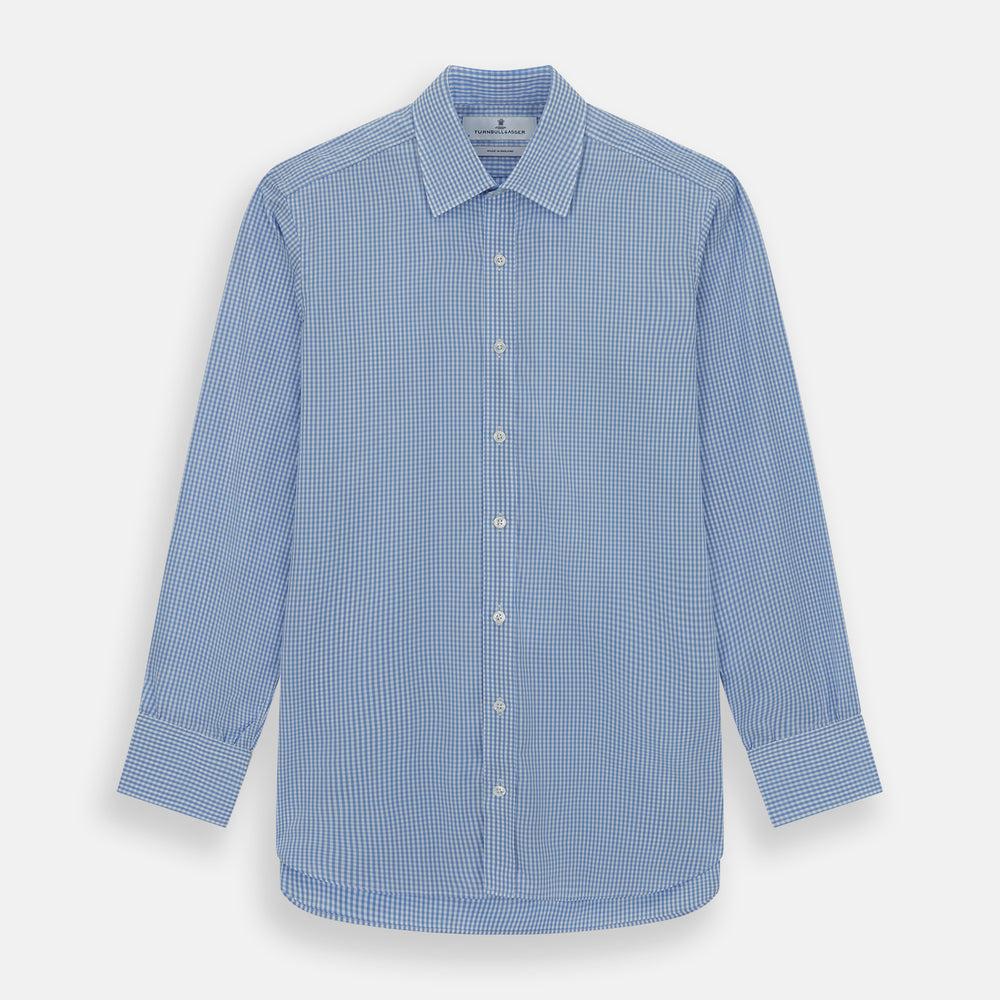 The Turnbull & Asser Light Blue Gingham Check Shirt features a T&A collar, 3-button cuffs, classic gingham pattern, and white buttons down the front, shown laid flat on a white background.