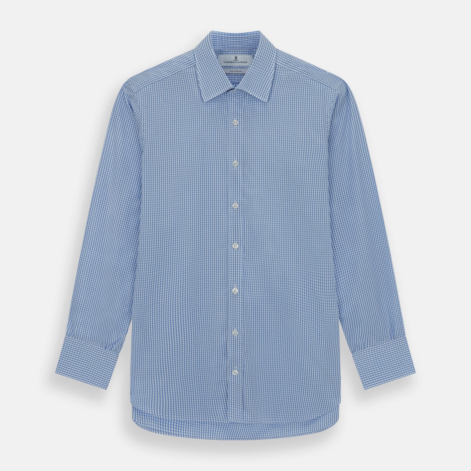 View 1 of product The Turnbull & Asser Light Blue Gingham Check Shirt features a T&A collar, 3-button cuffs, classic gingham pattern, and white buttons down the front, shown laid flat on a white background.