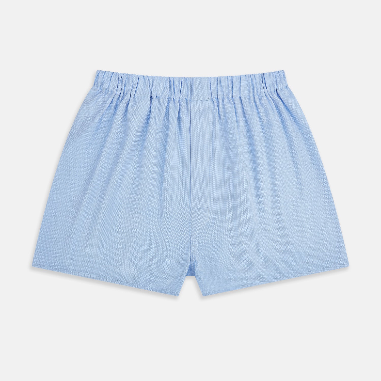 View 1 of product Plain Blue Godfrey Boxer Shorts by Turnbull & Asser, crafted from smooth Italian cotton. Featuring a light blue color and elastic waistband, these men's boxers are shown flat on a white background with a classic, pattern-free design.