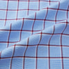 View 6 of product The Turnbull & Asser Blue and Burgundy Windowpane Mayfair Shirt features long sleeves, a light blue base with burgundy windowpane checks, a classic collar, and white buttons.