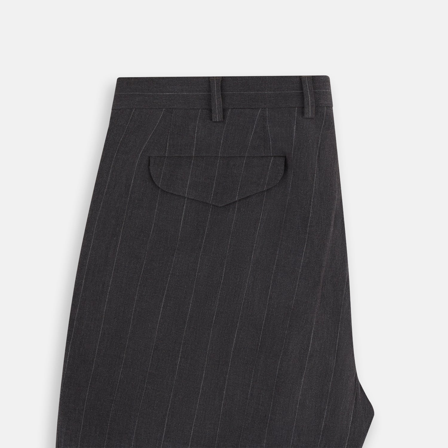 View 6 of product Turnbull & Asser’s Dark Chocolate Striped Edmund trousers feature straight-cut legs, a relaxed fit, button closure, and belt loops. These cotton trousers display subtle vertical stripes against a plain white background.