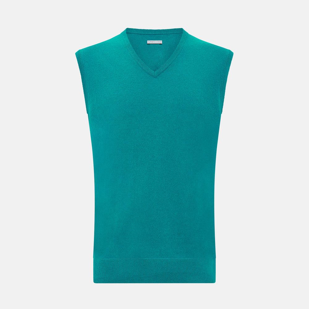 The Turnbull & Asser Turquoise Cashmere V-Neck Vest features ribbed detailing at the neck, armholes, and hem. Shown on a white background, its soft cashmere fabric brings refined charm to any distinguished look.