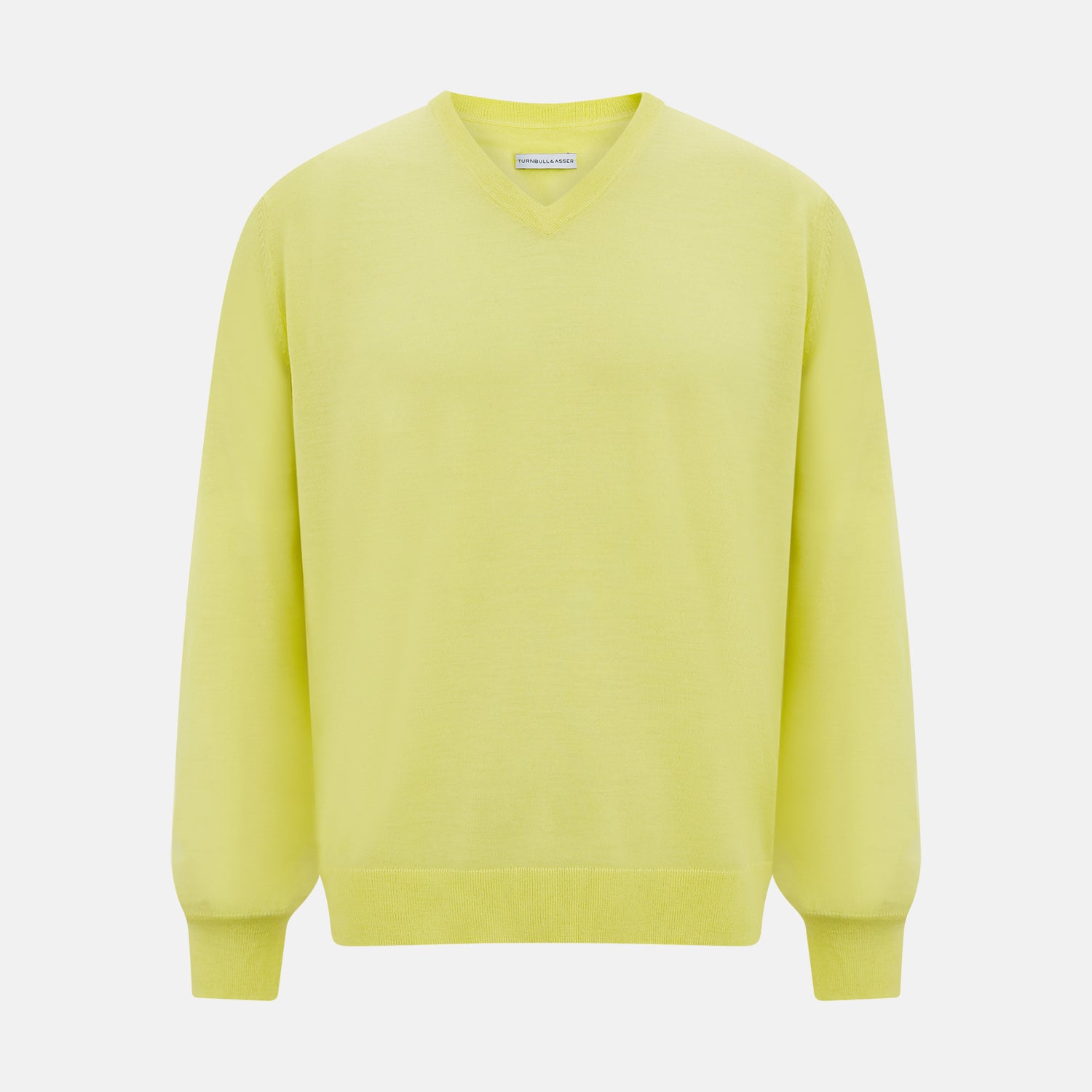 View 1 of product The Turnbull & Asser Bright Yellow Cashmere V-neck Jumper, a plain long-sleeved knitwear sweater, is showcased against a white background.