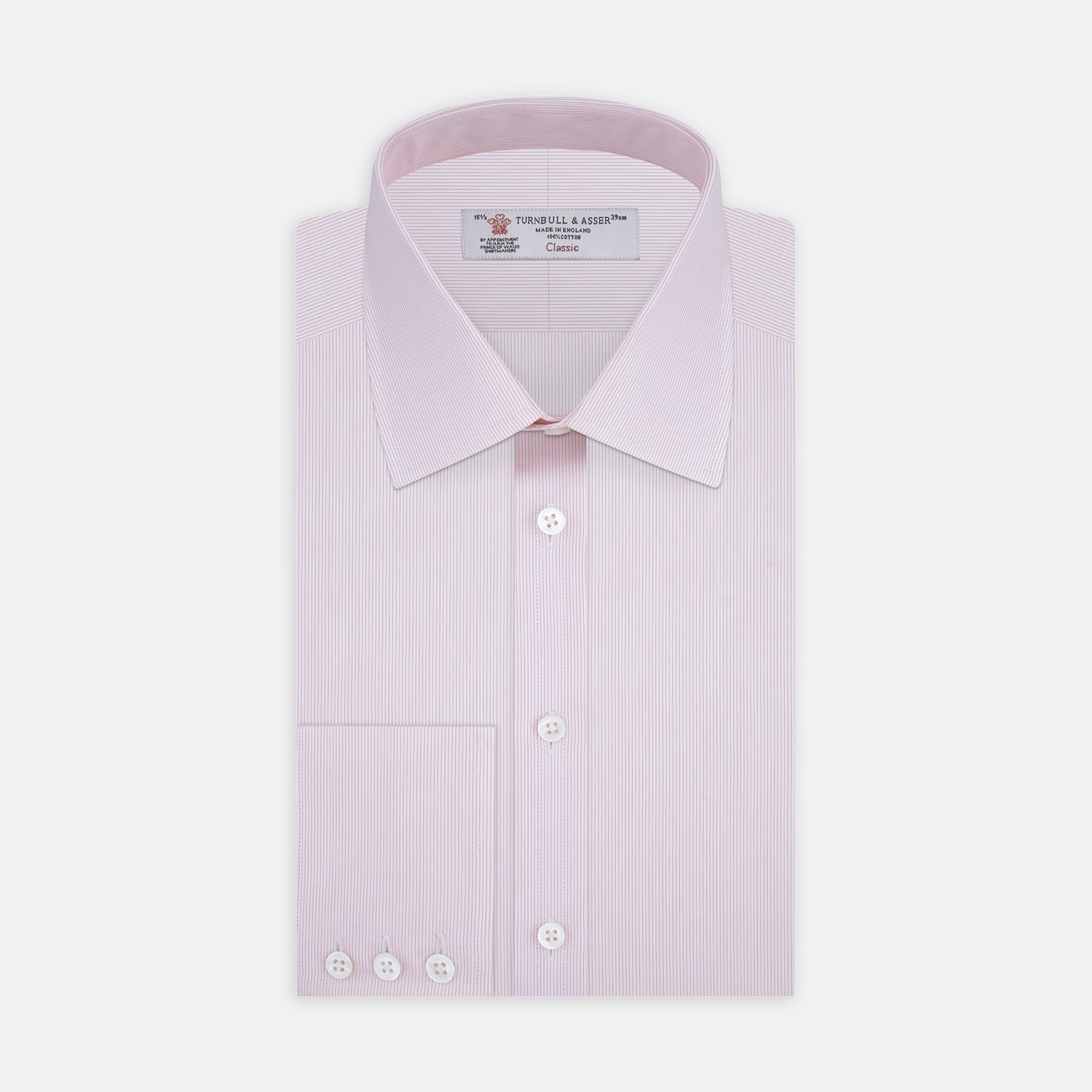 View 1 of product The Turnbull & Asser Pink Hairline Stripe Shirt features a T&A collar and 3-button cuffs, shown neatly folded against a white background—perfect as a smart office shirt.