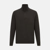 View 1 of product The Turnbull & Asser Brown Half-Zip Cashmere Jumper features a plain, long-sleeve design with a high collar and quarter-zip neckline, showcased against a white background.