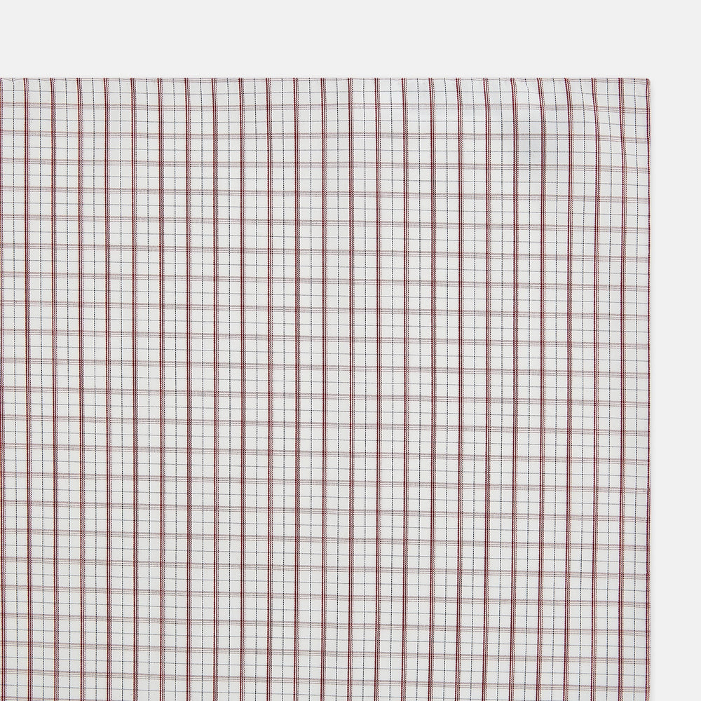 The Turnbull & Asser Red Tattersall Check Hand-Rolled Handkerchief features thin red and blue grid lines on white, laid flat in a rectangular shape and expertly crafted in England.
