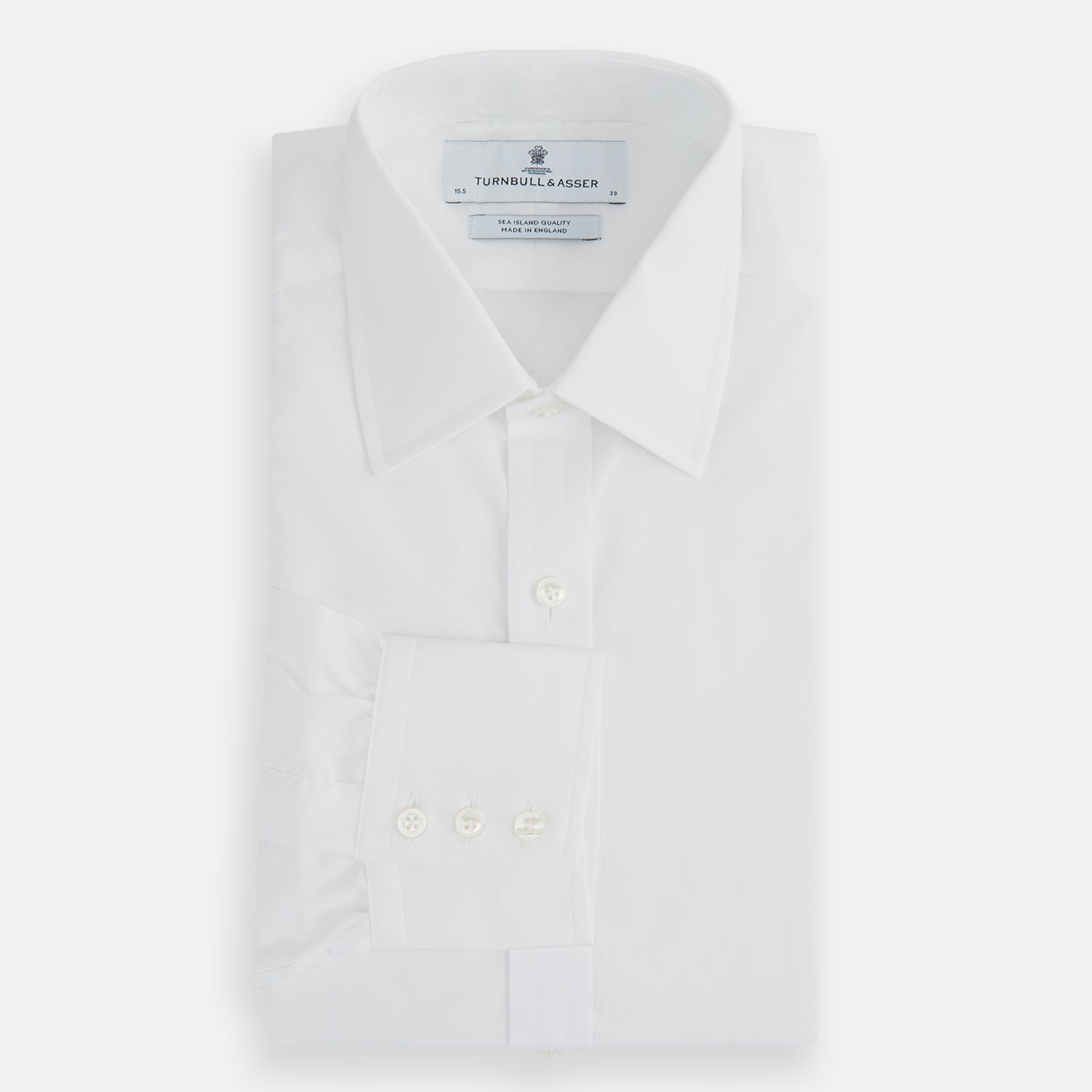 View 4 of product The Turnbull & Asser White Sea Island Quality Cotton Shirt features a T&A collar and 3-button cuffs, crafted from premium cotton and showcased against a plain white background.
