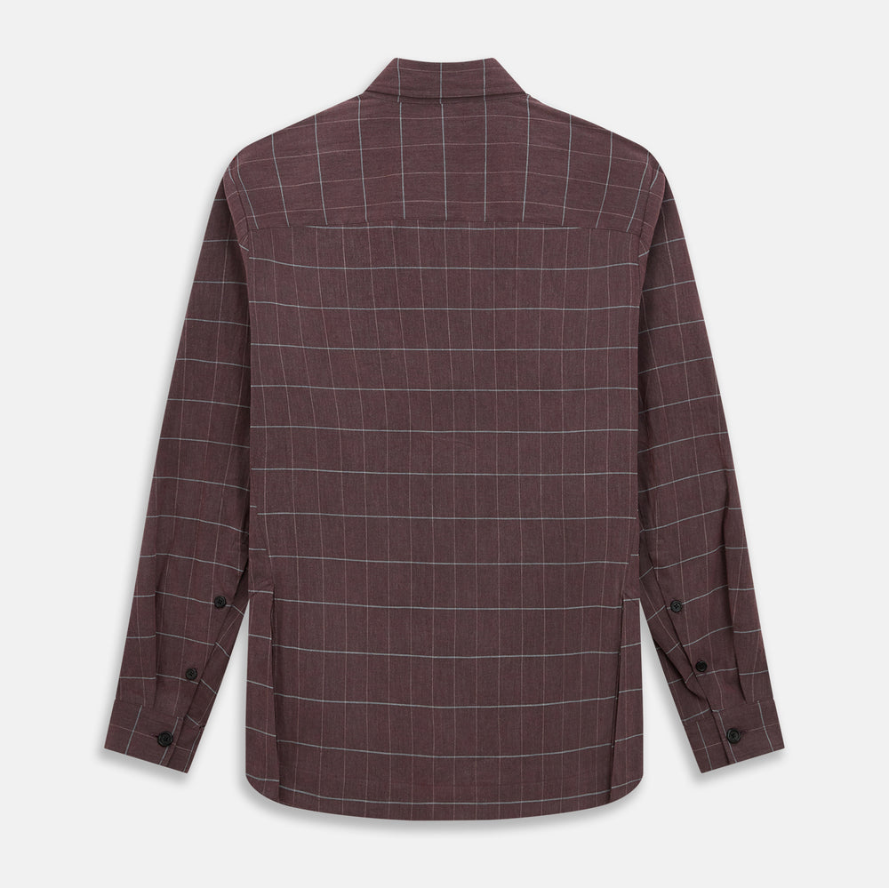 The Turnbull & Asser Burgundy Check Hampstead Overshirt, featuring a button-up front, collar, white windowpane pattern, and two front pockets, is laid flat on a white background—perfect for elegant formal wear.