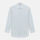 The Blue Grid Check Mayfair Shirt by Turnbull & Asser is a long-sleeve, button-up shirt with a T&A collar, crafted from organic cotton in a light and dark blue grid pattern, shown flat against a white background.