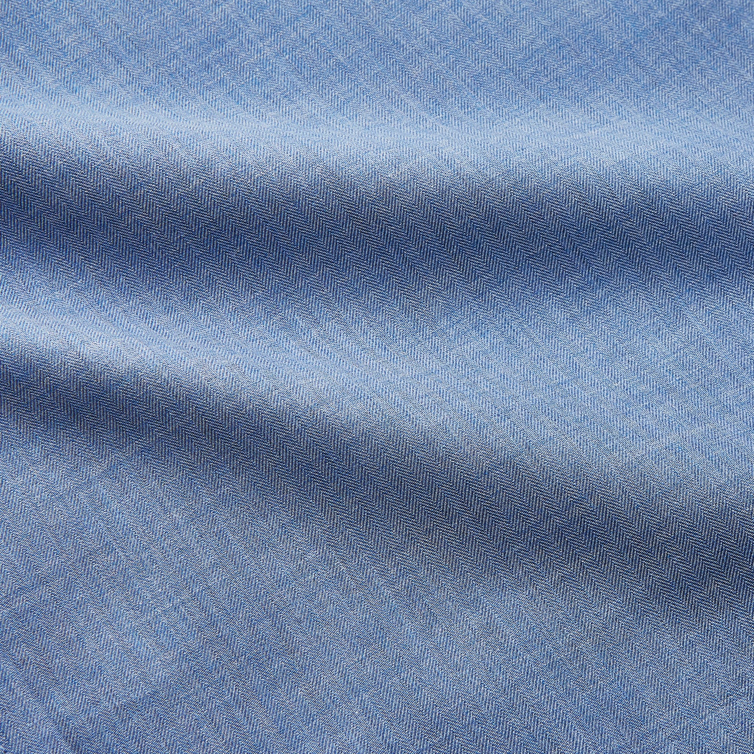 View 3 of product The Turnbull & Asser Blue Cotton Weekend Fit Blake Shirt features a light blue color, long sleeves, stand collar, white buttons, and a curved hem—ideal for casual weekends. Laid flat on a white background.