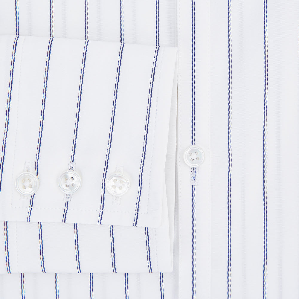 The Dark Navy Double-Pinstripe Westminster Shirt by Turnbull & Asser, featuring a Turnbull collar and cuffed sleeves, is displayed laid flat on a plain white background, highlighting its British craftsmanship.